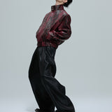 Opium Bombardeiro cravejado de pele de cobra