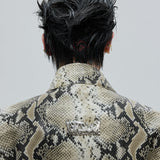 Opium Bombardeiro cravejado de pele de cobra